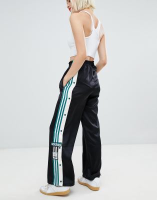 adidas originals three stripe popper pant with vintage logo in black