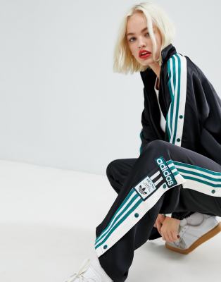 adidas originals three stripe popper pant with vintage logo in black