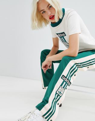 adidas originals three stripe popper pant with vintage logo in black