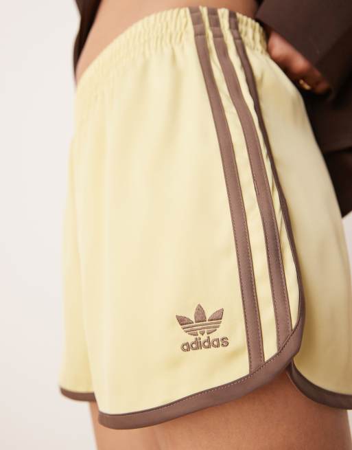 adidas Originals three stripe sprinter shorts in yellow ASOS
