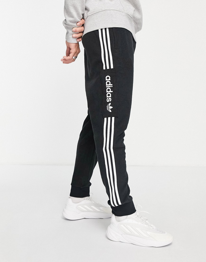 adidas Originals three stripe sweatpants with cuff in black