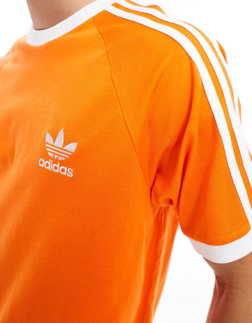 adidas Originals three stripe t-shirt in orange ASOS