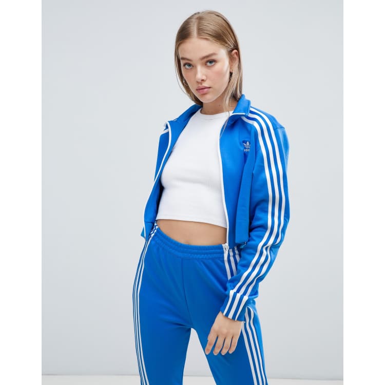 White adidas jacket with cheap blue stripes