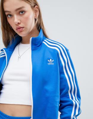 blue adidas jacket with white stripes
