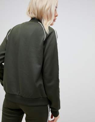 adidas originals three stripe track pants in khaki