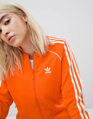 adidas originals three stripe track jacket in orange