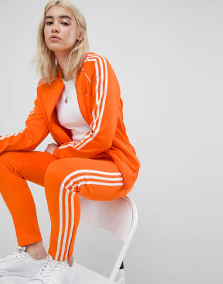 adidas originals three stripe cigarette pants in orange