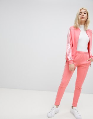 adidas originals adicolor three stripe track jacket in pink