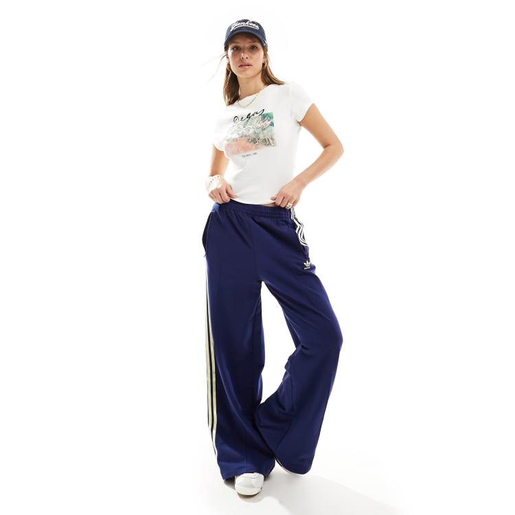 adidas Originals three stripe track pants in navy and yellow