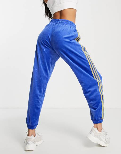 adidas Originals three stripe velour track pant in blue