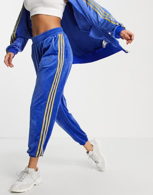 adidas Originals three stripe velour track pant in blue