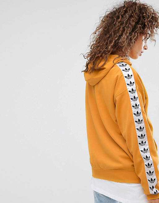 Infectar Dentro servir adidas Originals Tnt Taped Side Stripe Pullover Hoodie In Yellow | ASOS