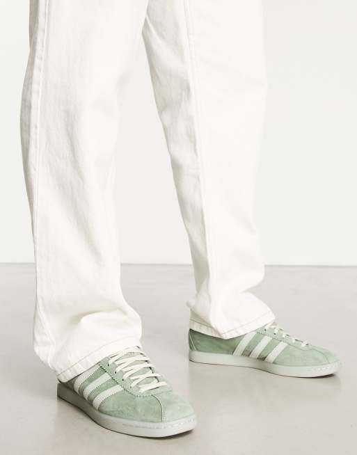 Adidas grey store and green shoes