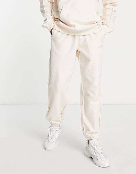 Donna Abbigliamento da Pantaloni casual eleganti e chino da Pantaloni harem Joggers con fondo elasticizzato crema di ASOS in Bianco 