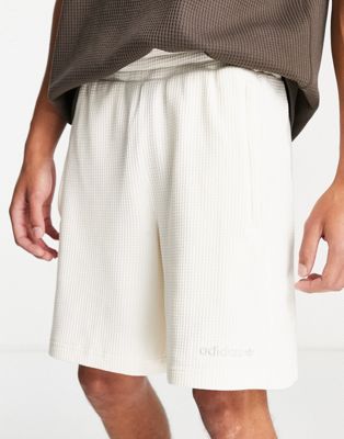 adidas Originals 'Tonal Textures' waffle shorts in off white