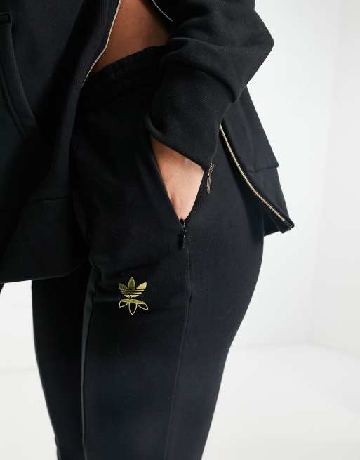 ADIDAS ORIGINALS LARGE LOGO TRACKPANTS BLACK/GOLD BNWT UK 8,10