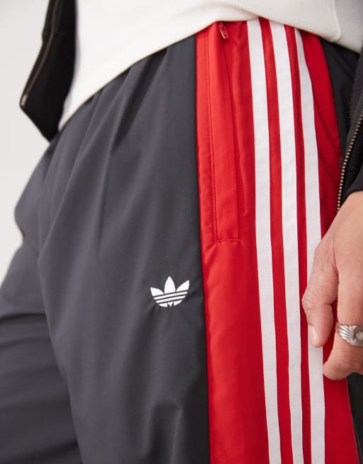 adidas Originals track pants in black and red ASOS
