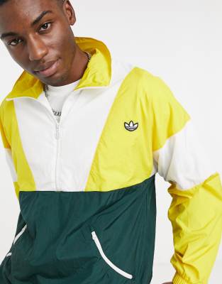 yellow adidas track top