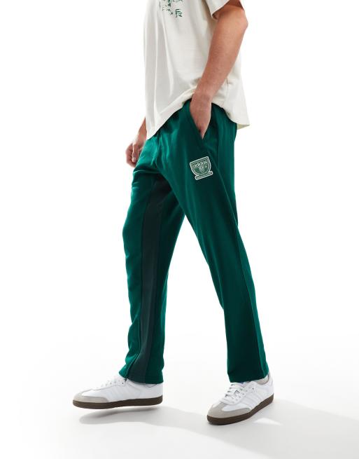 Green adidas originals tracksuit bottoms best sale