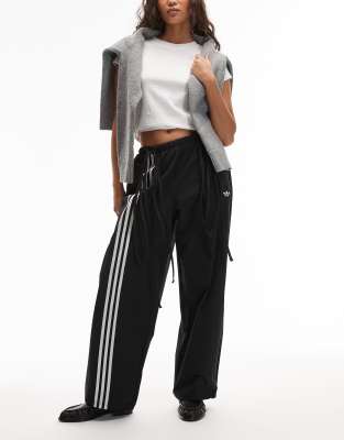 adidas Originals - Trainingshose aus Webstoff in Schwarz mit Schleifendetail