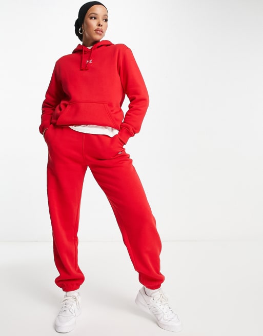 adidas Originals Trefoil Essentials joggers in red | ASOS