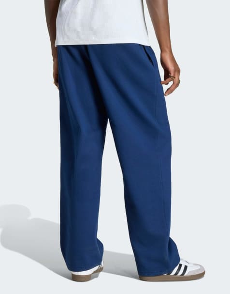 adidas Originals Trefoil essentials pantalon à bas ouvert en bleu indigo nuit - view 1