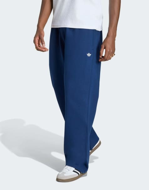 adidas Originals Trefoil essentials pantalones de bajo abierto en azul índigo oscuro - view 1