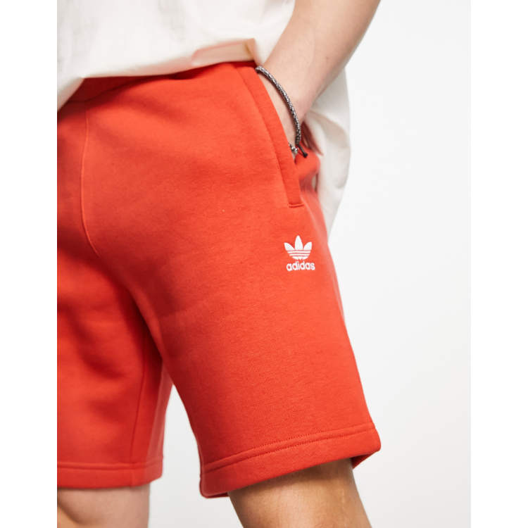 adidas Originals Trefoil Essentials shorts in red | ASOS