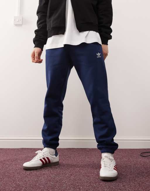 adidas Originals trefoil essentials trackies in navy ASOS