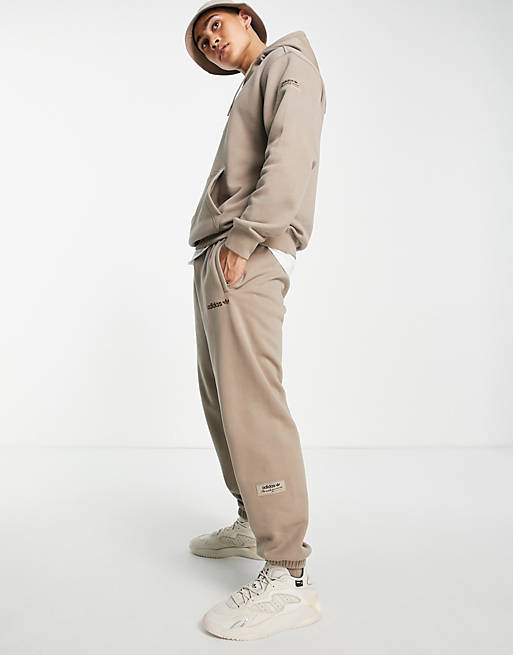 adidas Originals 'Trefoil Linear' premium joggers in chalky brown with leg  patch | ASOS
