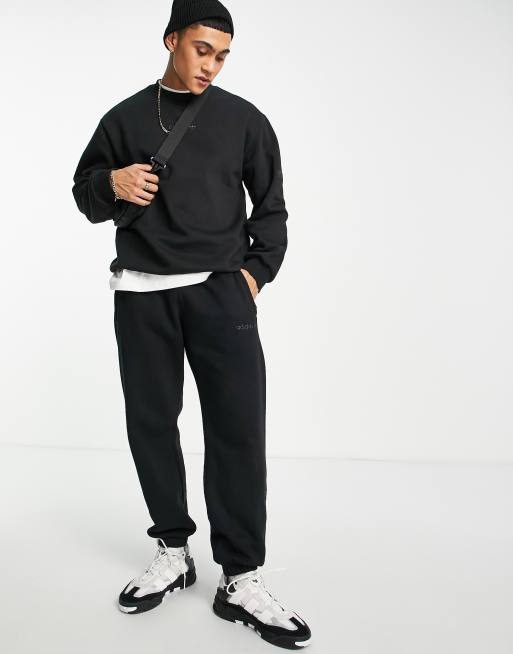 adidas Originals 'Trefoil Linear' premium trackies in black with leg ...