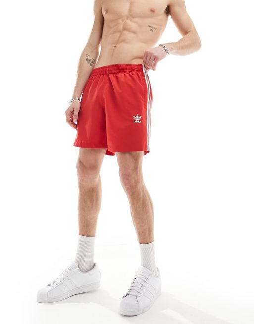adidas Originals trefoil three stripe swim shorts in red ASOS