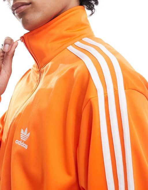adidas Originals unisex firebird track jacket in orange