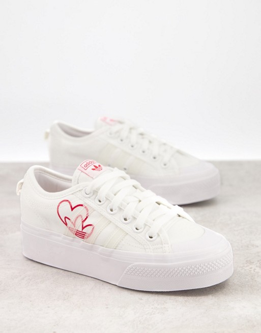 adidas Originals Valentines Nizza platform trainers in off white with heart print