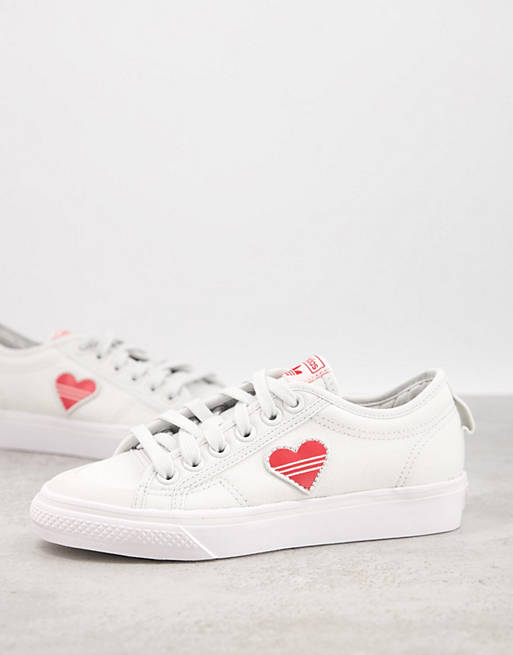 adidas Originals Valentines Nizza trainers in white with heart print | ASOS