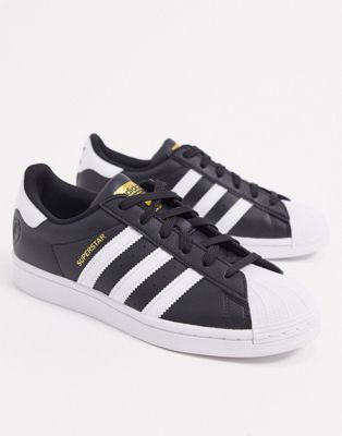 black and white adidas superstar trainers