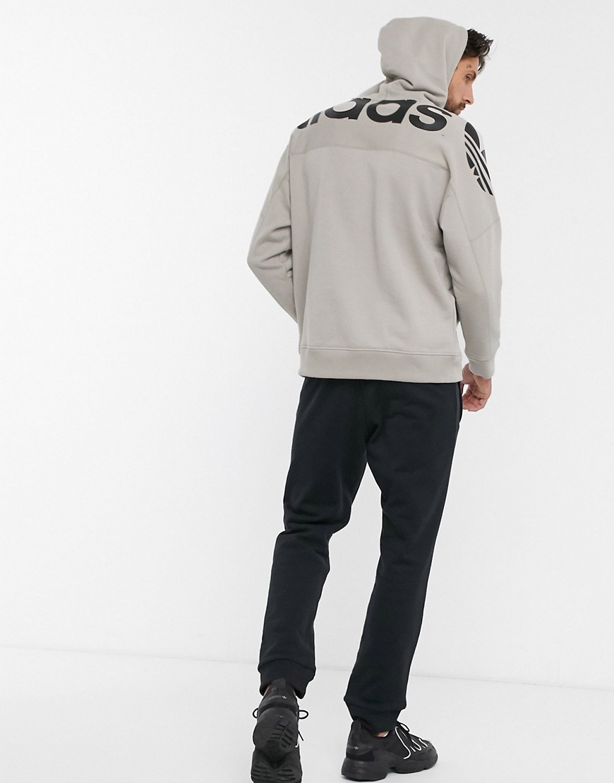 Adidas Originals vocal hoodie with back print in brown