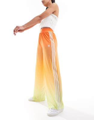 adidas Originals - Weit geschnittene Netzstoff-Hose in Orange mit Farbverlauf