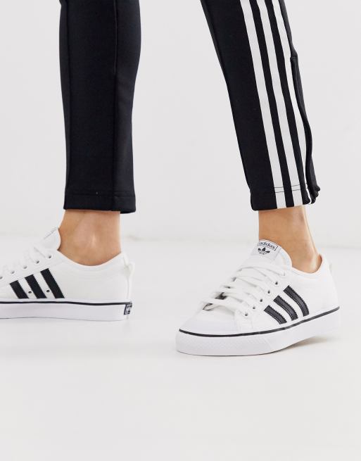 Adidas originals nizza shop trainers in white