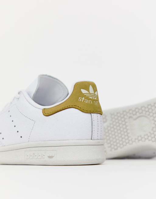 adidas Originals white and yellow Stan Smith trainers