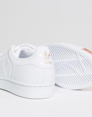 white and rose gold adidas trainers