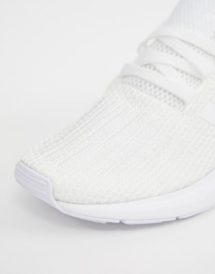 all white swift run shoes