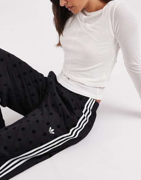 adidas Originals wide leg satin track pants in black polka dot - view 1
