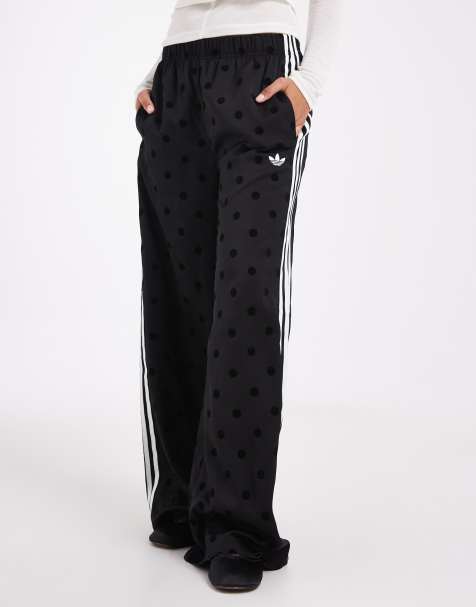 adidas Originals wide leg satin track pants in black polka dot - view 1