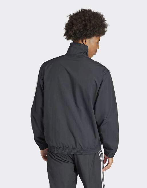 adidas Originals woven Firebird zip through track top in adidas Originals woven Firebird zip through track top in