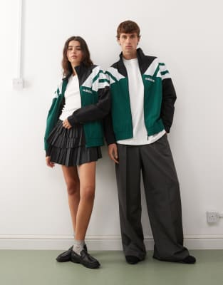 adidas Originals woven track top in green