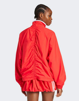 adidas Originals WOVEN TT ZIP in red | ASOS