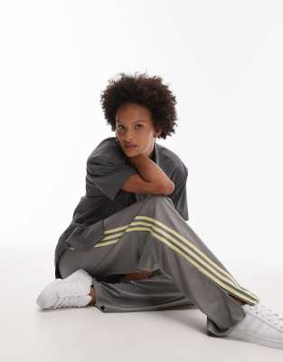 adidas Originals adidas Originals x ASOS Firebird Loose track pants in grey and yellow