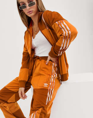 Adidas originals x danielle cathari deconstructed firebird track on sale pant in orange