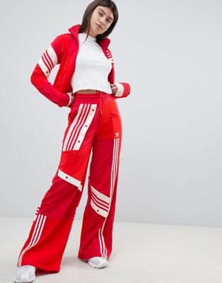adidas Originals X Danielle Cathari - Pantaloni sportivi destrutturati  rossi | ASOS